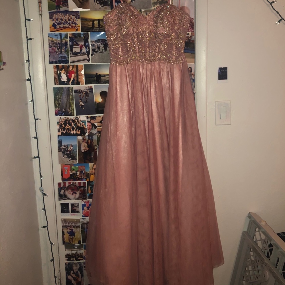 Never worn, selling to fundraise